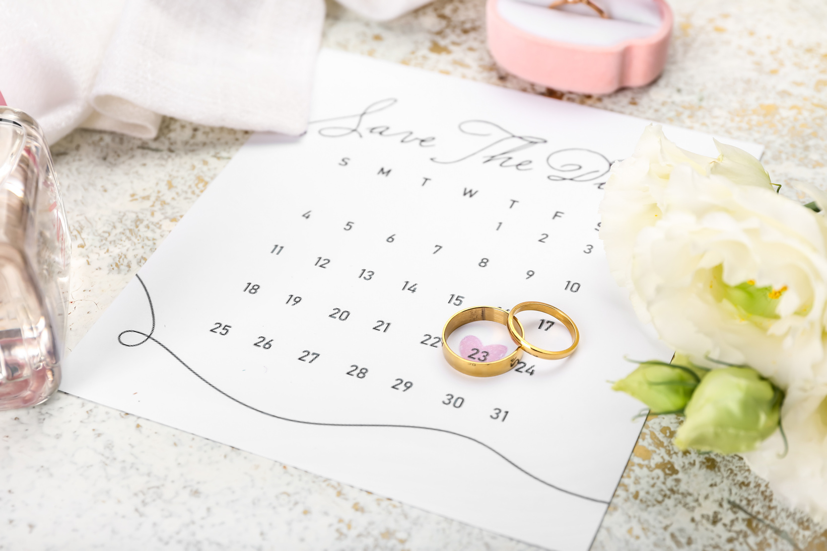 Beautiful Composition with Wedding Calendar on Table